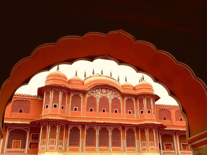 A courtyard of the City Palace in Jaipur under a clear sky.