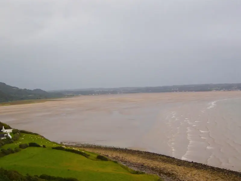 A wide coastal bay under an open sky, the kind of place reached in a couple of hours.