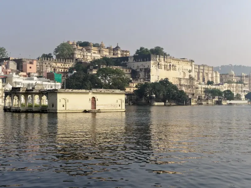 The City Palace and Lake Pichola in Udaipur seen across the water.